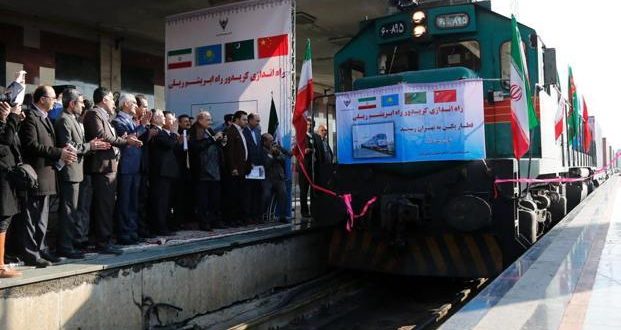 Iranian officials applaud on the platform as the first train connecting China and Iran arrives at Tehran Railway Station on Monday. Photo: AFP